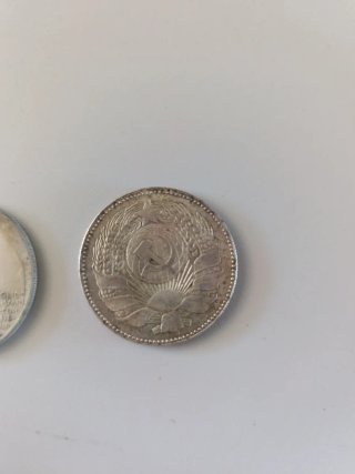 Monedas conmemorativas Mussolini y Lao Tse