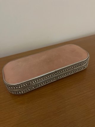 Bolso de mano rosa y plateado para eventos