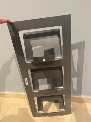 Revistero metálico de pared