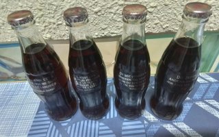 12 bottiglie Coca-Cola ultima edizione 1999 Svizzera