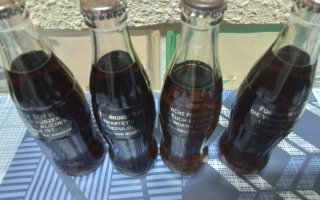 12 bottiglie Coca-Cola ultima edizione 1999 Svizzera