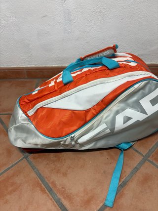 Paletero de pádel naranja y blanco