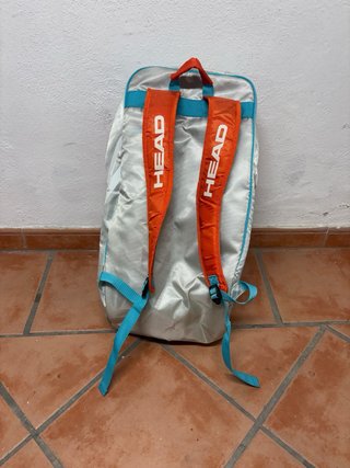 Paletero de pádel naranja y blanco