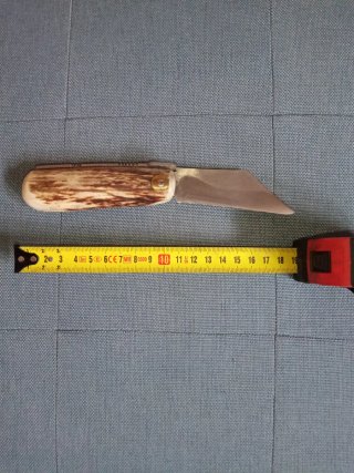 Herramienta de corte de bolsillo con mango de asta