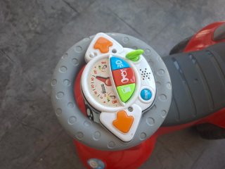 Passeggino Chicco rosso e giallo con forma di auto