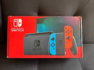 Nintendo Switch + Zelda Breath + Mario Odyssey