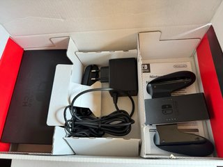 Nintendo Switch + Zelda Breath + Mario Odyssey
