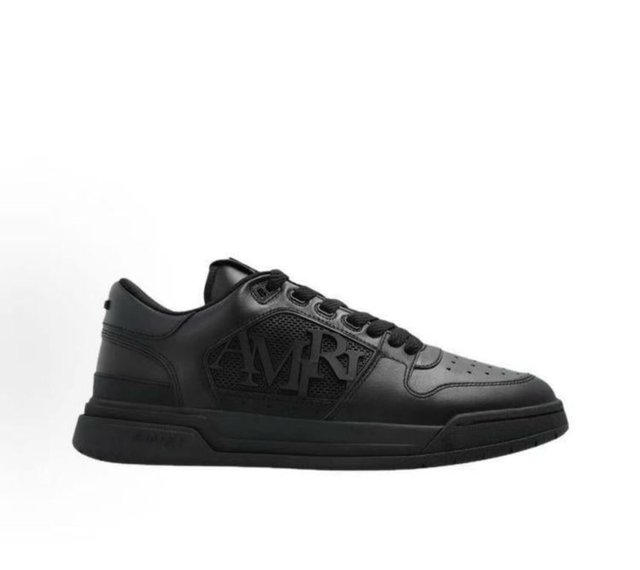 Tenis Amiri grises y blancos