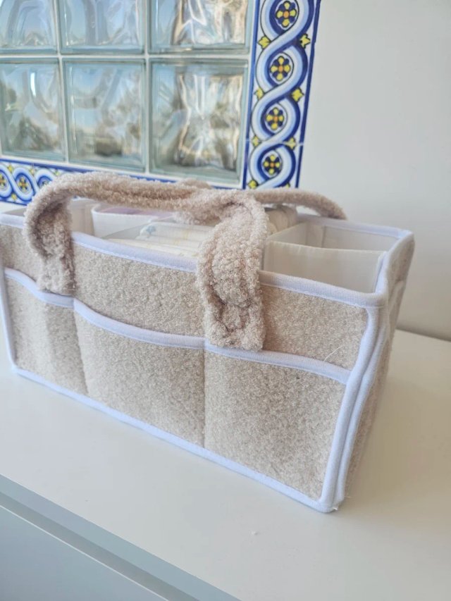 Organizador de pañales de tela beige