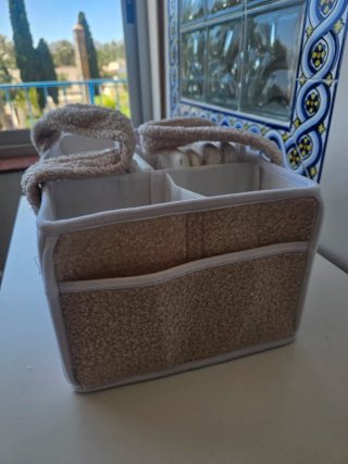 Organizador de pañales de tela beige