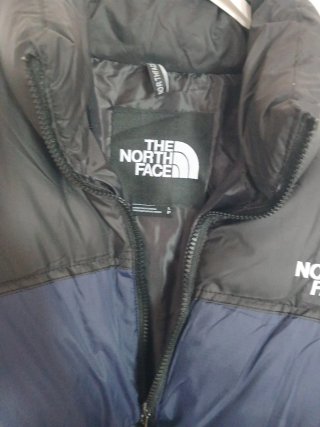 The North Face plumífero azul y negro Talla L