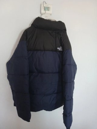 The North Face plumífero azul y negro Talla L