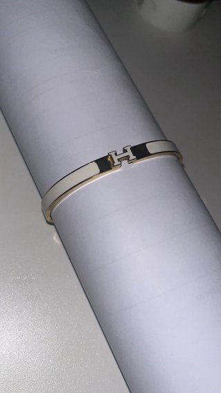 Pulsera Hermès H Dorada y Blanca