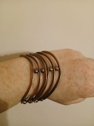 2 Bracciali intrecciati color oro