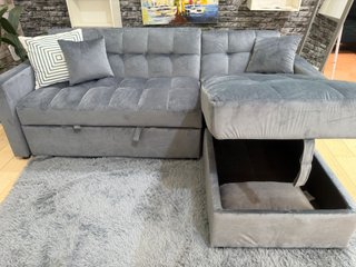 Sofá cama gris con arcón