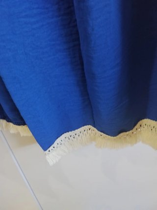 Cárdigan azul con detalles
