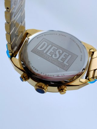 Reloj Diesel Spiked nuevo dorado y verde