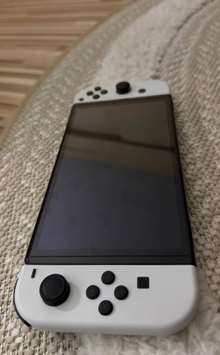 Nintendo Switch OLED + Juegos