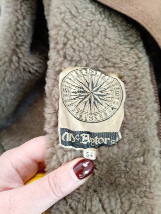 Cappotto marrone con pelliccia sintetica