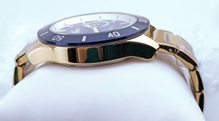 Reloj Lacoste nuevo, dorado y azul