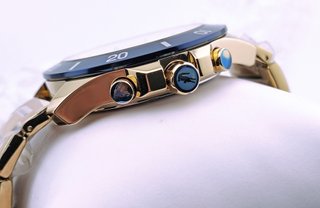 Reloj Lacoste nuevo, dorado y azul