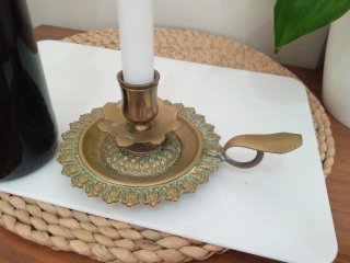 Antiguo candelabro porta velas o palmatoria
