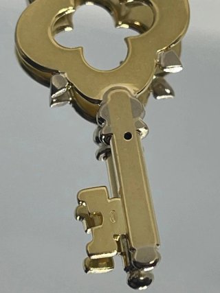 COLGANTE ORO 18 QUILATES, LLAVE