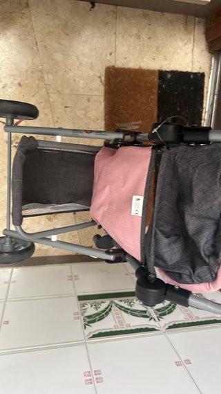 Carrito para muñecas rosa