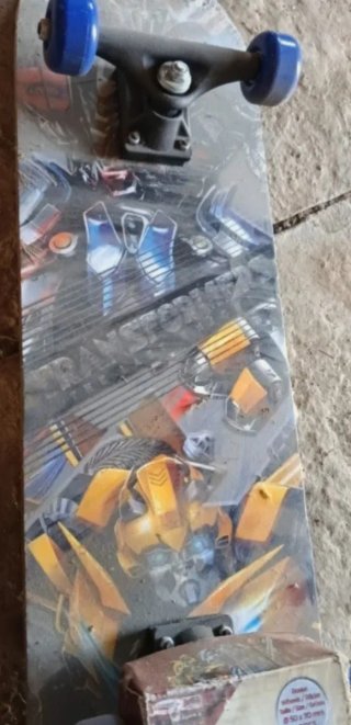 Monopatín Transformers 31