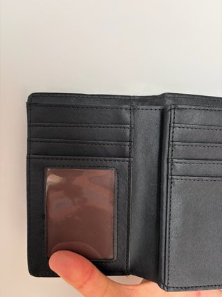 Cartera de piel marrón y negra