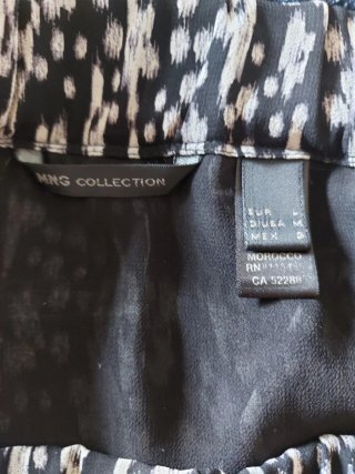 Falda Mango asimétrica estampado en blanco y negro