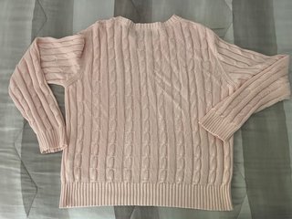 Maglioncino rosa in cotone, veste comodo.