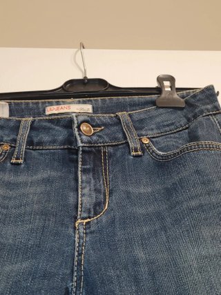Jeans skinny blu con zip
