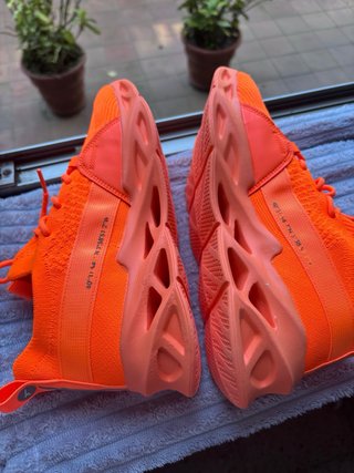 Zapatillas naranjas súper ligeras