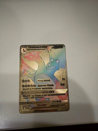 Tarjeta Pokémon Charizard GX Dorada