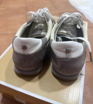 Zapatillas Michael Kors grises y blancas