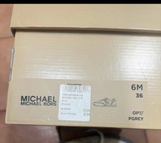 Zapatillas Michael Kors grises y blancas