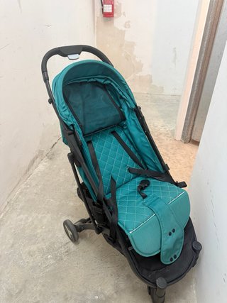 Carro de bebé plegable color turquesa