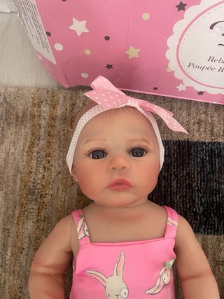 Bambola reborn con accessori