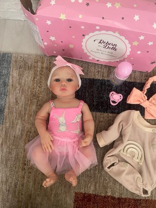 Bambola reborn con accessori