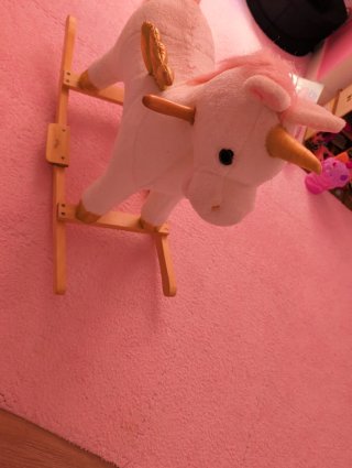 Caballito balancín unicornio rosa