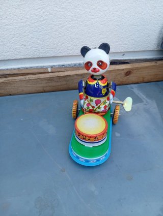 Juguete de cuerda panda con tambor
