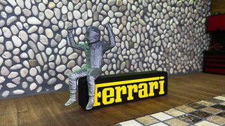 Insegna Ferrari con pilota