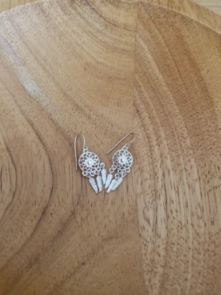 Orecchini a forma di acchiappasogni