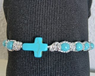 Pulsera decenario con cruz y cuentas turquesa