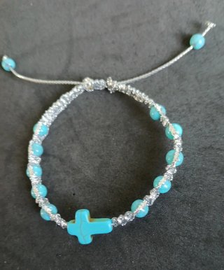 Pulsera decenario con cruz y cuentas turquesa