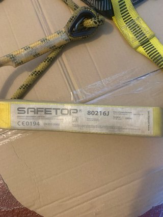 Arnés de seguridad y cuerda regulable