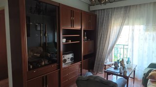 Mueble de salón madera y cristal