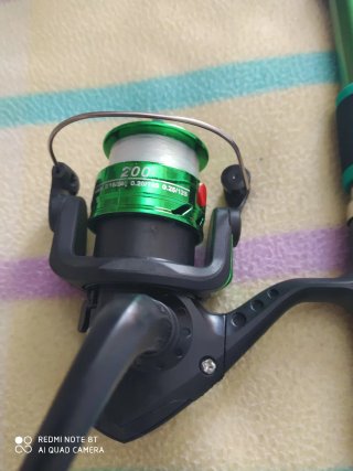 Caña de pesca NUEVA 1'80 metro con carrete y nylon