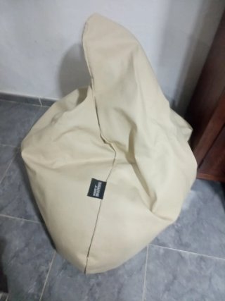 Puff de pera beige de tela